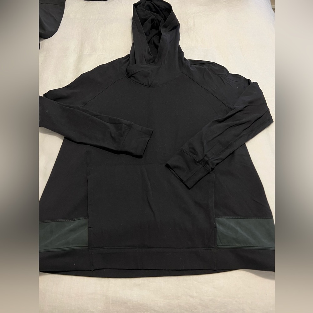 Lululemon black hooded pull over. Size 4.